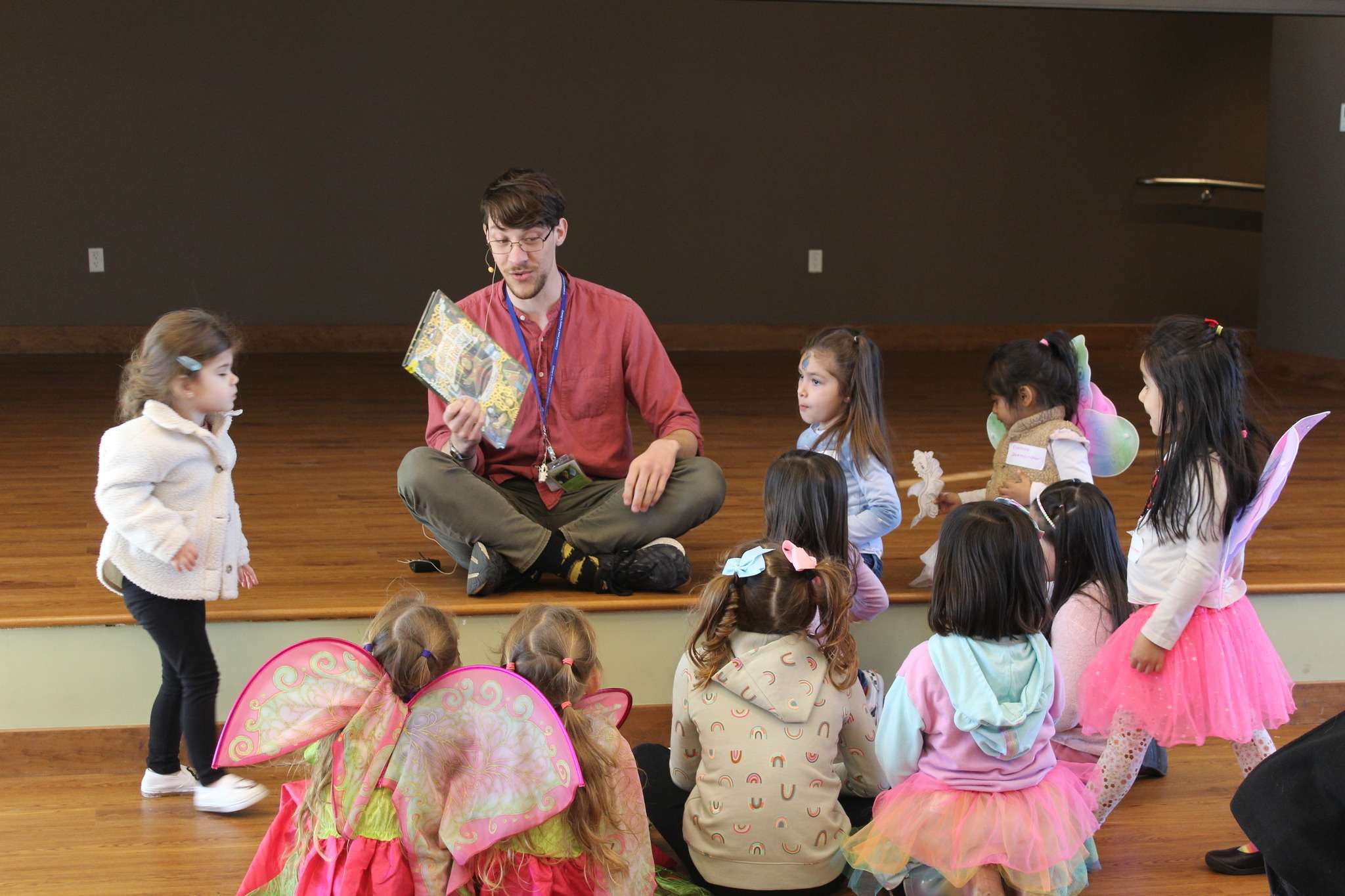 Mark reading a different story to children.