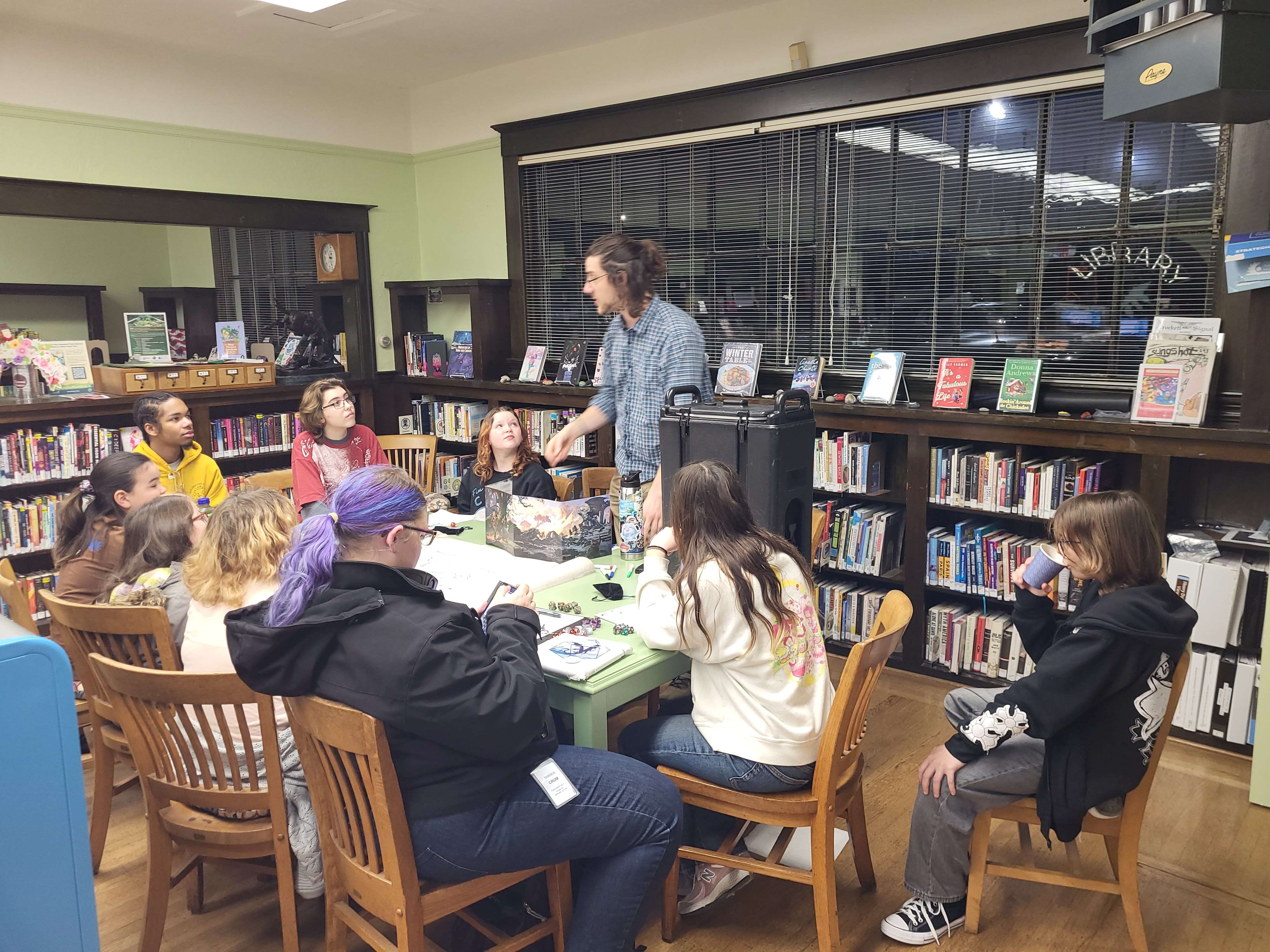 Mark running Dungeons and Dragons at the Crockett Library.
